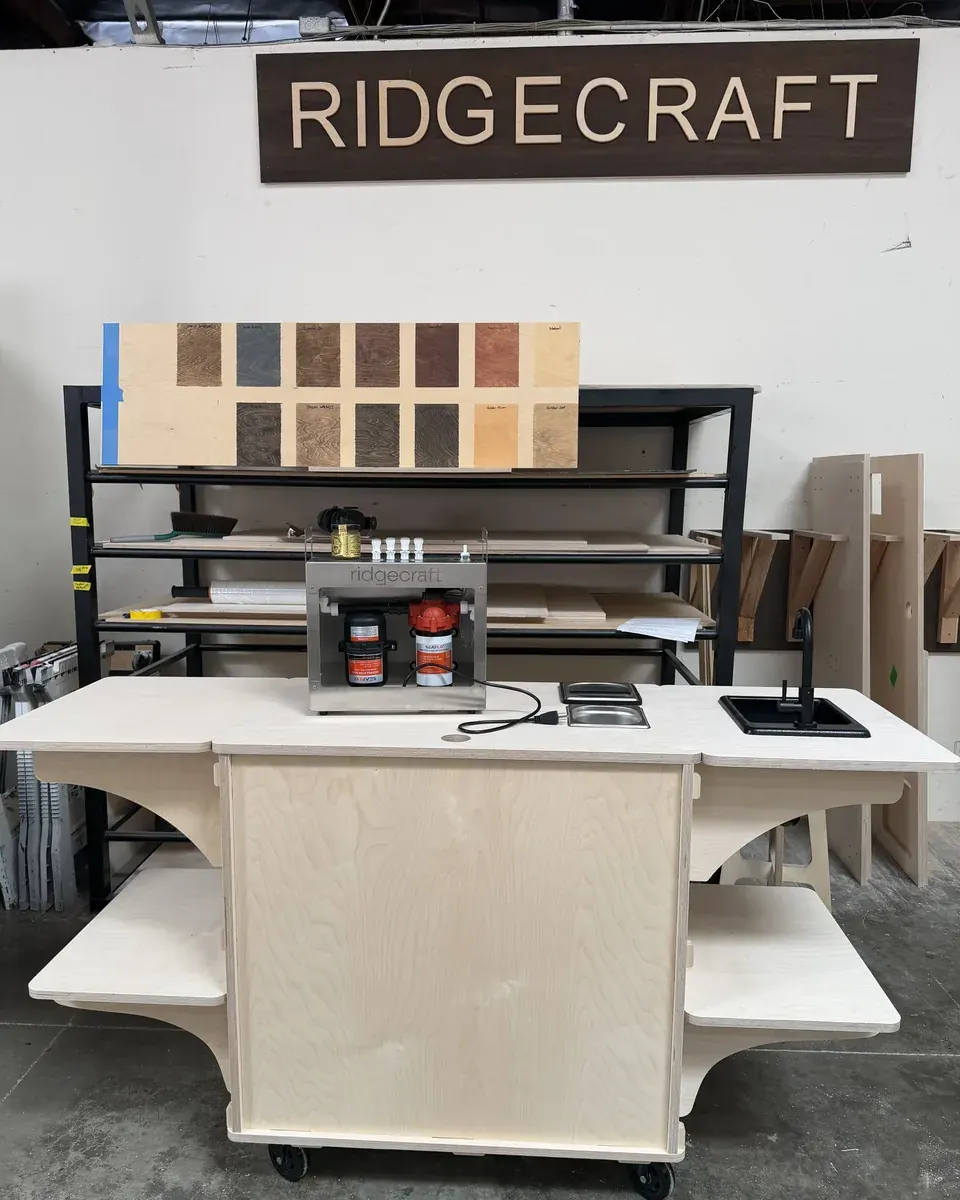 A RidgeCraft coffee cart on casters in our shop, with a sink, a water backbone and a knock box